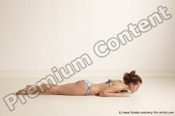 Swimsuit Gymnastic poses Woman White Moving poses Slim long brown Dynamic poses Academic